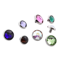 Set of colorful gemstone-like objects on a white background
