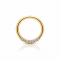 Gold ring with small diamonds on a white background