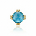 Gold earring with a blue gemstone on a white background