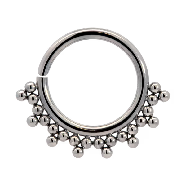 Elegant silver beaded clicker hoop ring, perfect for septum or ear piercings, featuring decorative han