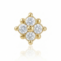 Gold earring with clear gemstones on a white background